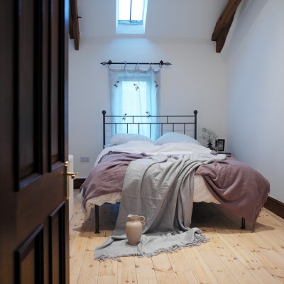 Knights In Iron unmade bed interior photography UK